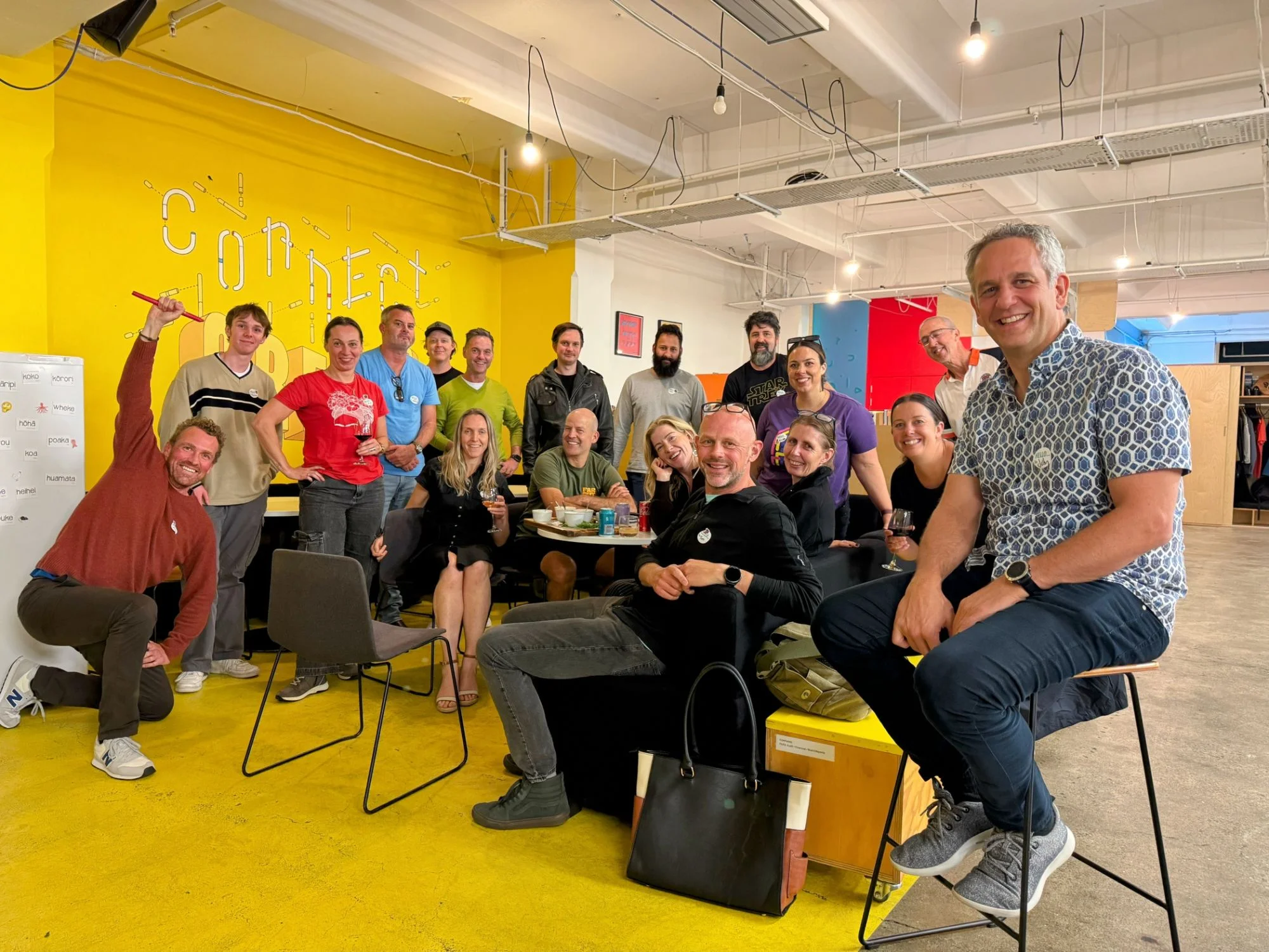 A large group of Wellington Startup Collective members posing together at Creative HQ