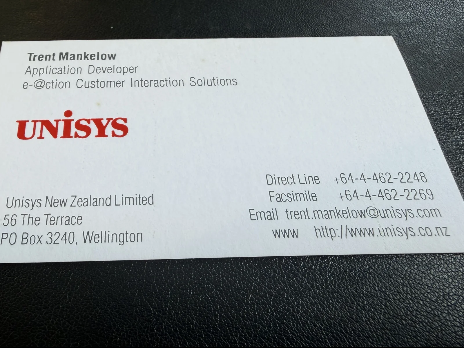 Trent's Unisys business card, listing him as Application Developer for e-@ction Customer Interaction Solutions