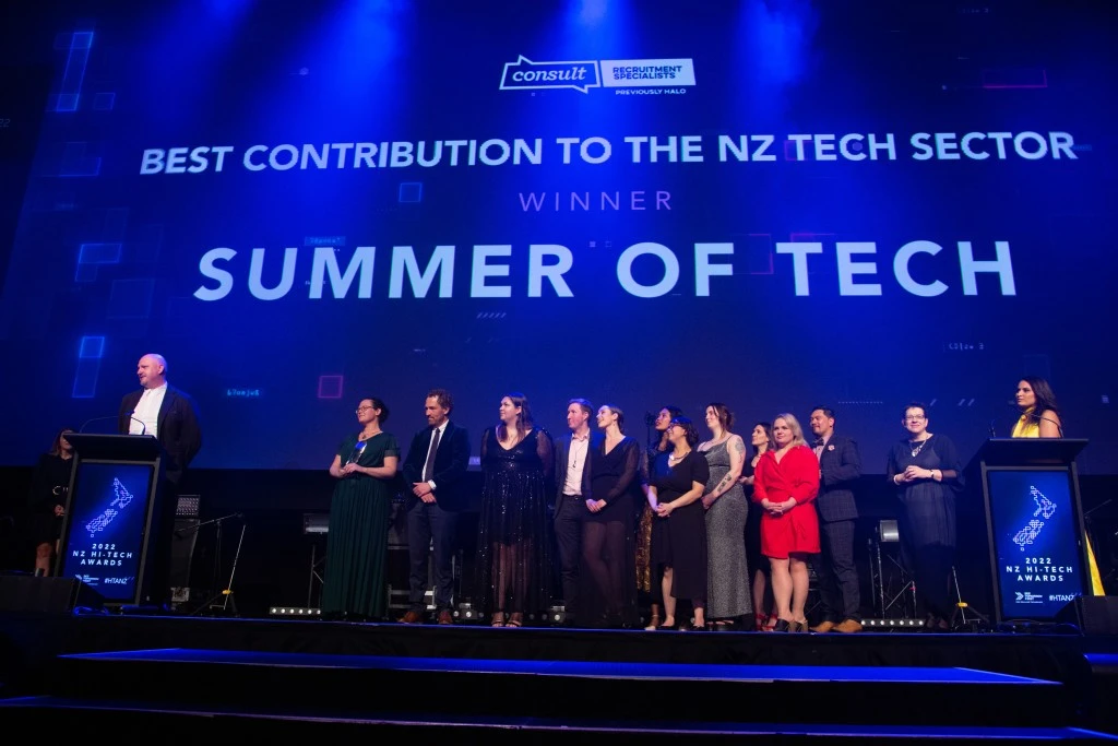 The Summer of Tech team accepting the Best Contribution to the NZ Tech Sector award on stage