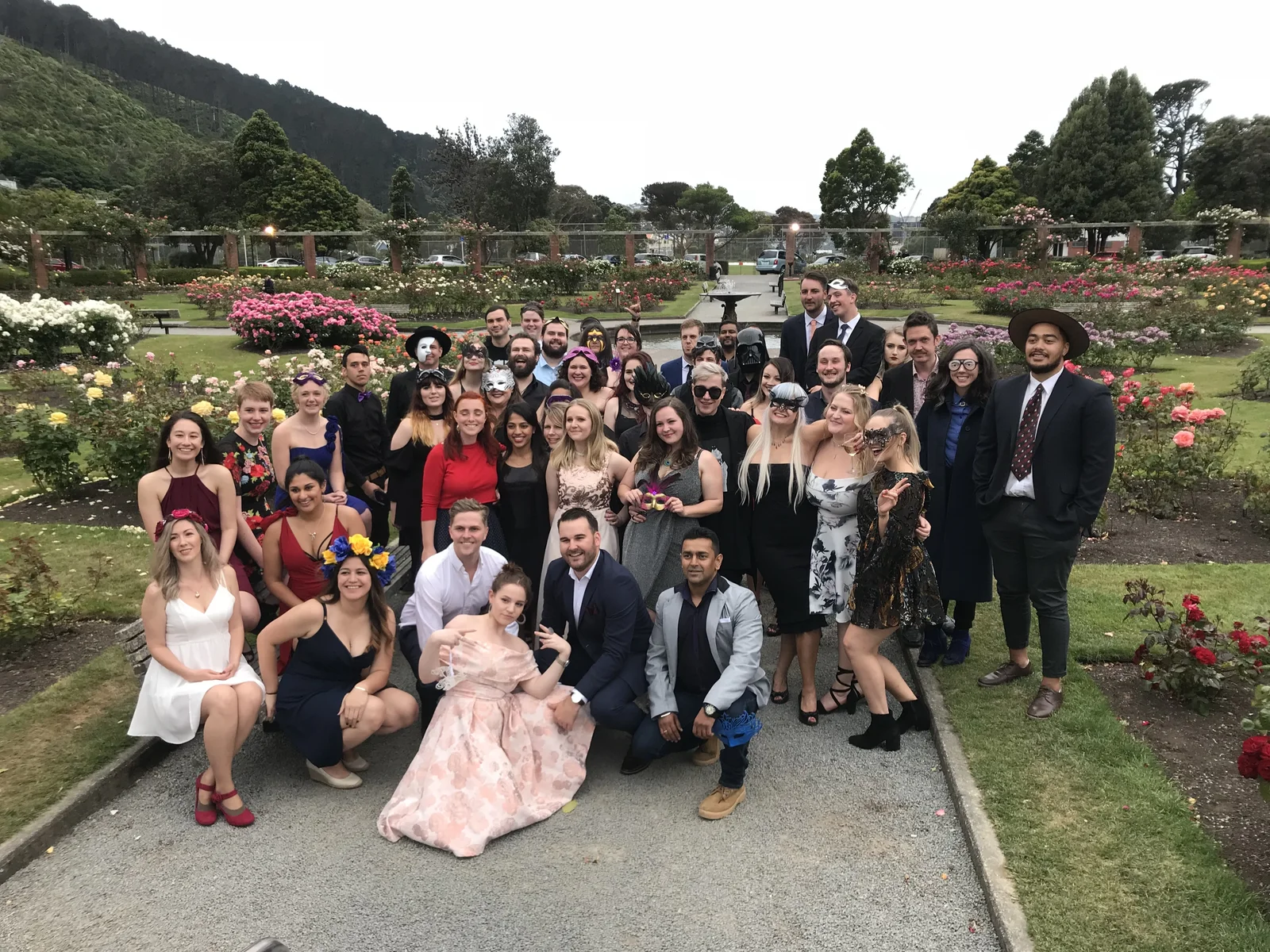The Trade Me Customer team in costume at their annual ball in the Wellington rose garden